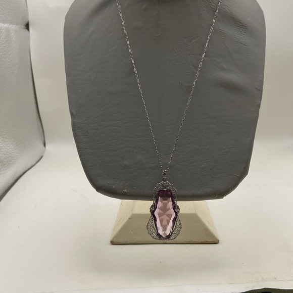 this is a is an antique costume piece being sold as its value as an antique. - Picture 4 of 7